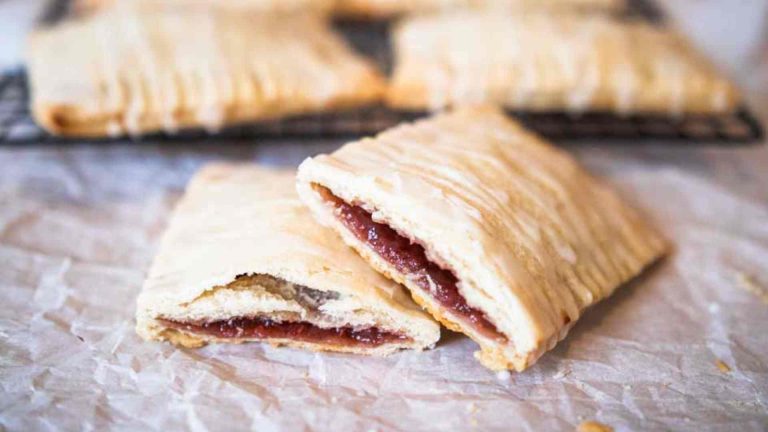 two sourdough pop tarts cut open to reveal fruit filling