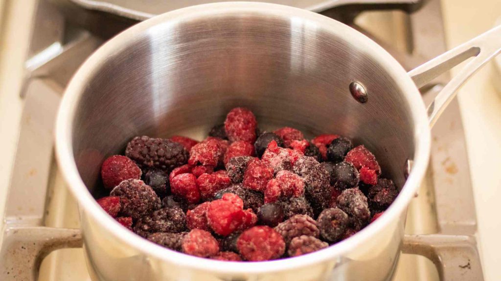 frozen berries in a small saucepan