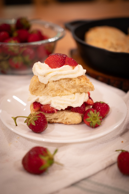 sourdough strawberry shortcake on a white plate