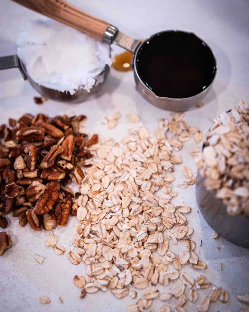 ingredients for making this easy granola recipe on a white background